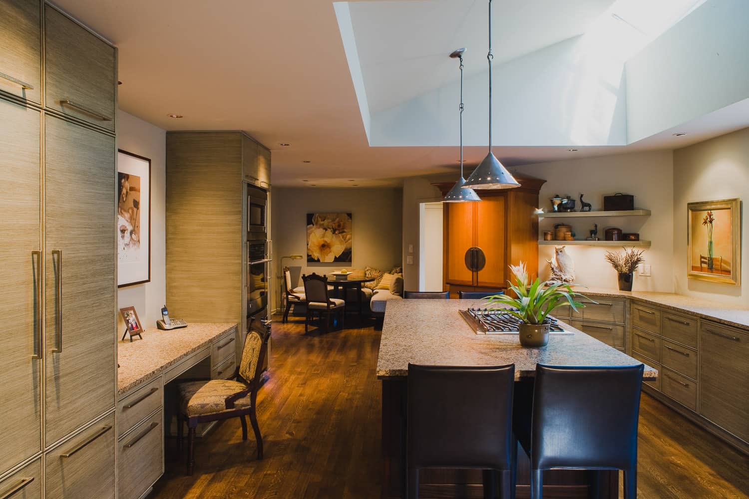 kitchen, hardwood floor, island, granite counter, desk, faux finish cabinet, pendant light, skylight